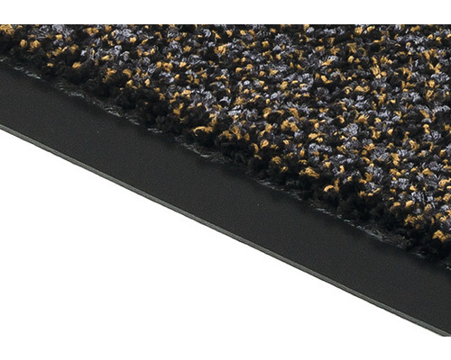 Vue détaillée d''un paillasson avec une texture grossière et une bordure noire