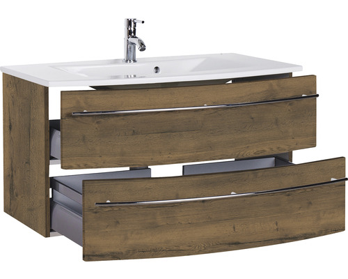 Meuble sous-lavabo avec deux tiroirs ouverts, lavabo en céramique et robinetterie