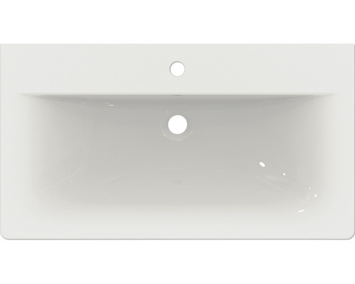 Vue de dessus d''un lavabo rectangulaire en céramique avec trou de robinetterie et trop-plein