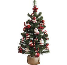 Arbre de Noël décoré avec des ornements en forme d''étoile, de bâton de sucre d''orge, d''ours en peluche et de Père Noël dans un sac de jute