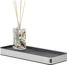 Aromatherapie-Diffusor mit Duftstäbchen auf Ablage