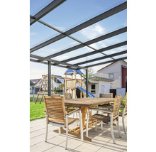 Terrasse avec toit de terrasse et mobilier de jardin