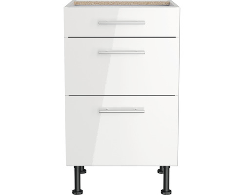 Weißer Unterschrank mit drei Schubladen und schwarzen Füßen.