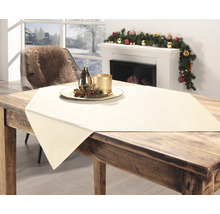 Table en bois décorée pour les fêtes avec chemin de table et décoration dans le salon