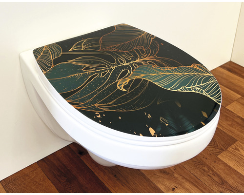 Toilette mit Dekorfolie mit Blattmuster