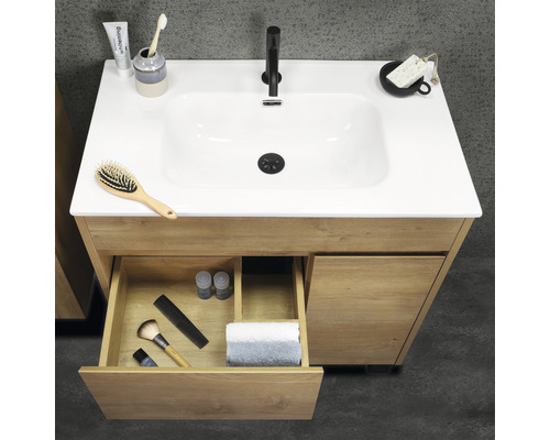 Meuble-lavabo de salle de bains en bois avec tiroir ouvert et vasque à poser