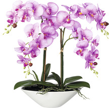 Künstliche Orchidee in weißem Topf