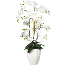 Künstliche Orchidee in einem geriffelten Topf