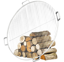 Runder Grillrost mit Holzstapel