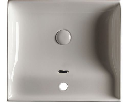 Lavabo en céramique de forme carrée avec garniture de vidange