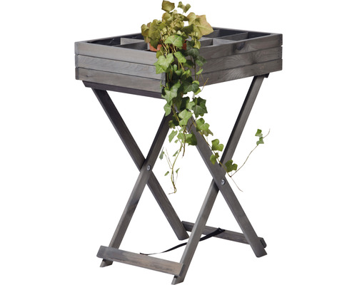Jardinière en bois avec support en forme de X et plante