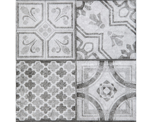 Motif de carreaux avec des motifs floraux et géométriques