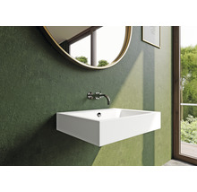 Modernes Badezimmer mit rechteckigem Waschbecken, rundem Spiegel und Armatur