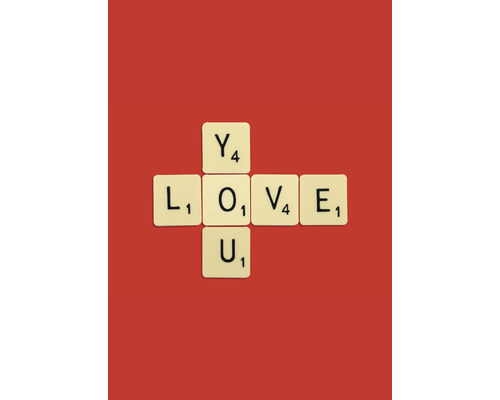 Kreuzworträtsel aus Buchstabensteinen mit dem Wort Liebe