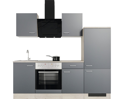 Cuisine intégrée avec évier, cuisinière, hotte aspirante et armoires murales