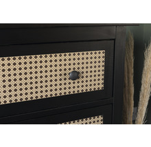 Gros plan d''une armoire noire avec tiroirs et façades en rotin