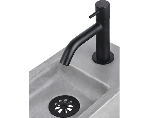 Lavabo avec robinetterie noire et garniture de vidange