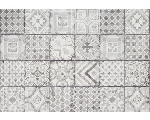 Motif de carreaux de sol en céramique avec différents motifs géométriques et floraux