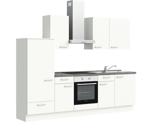 Cuisine complète avec évier, cuisinière, four, hotte aspirante et armoires blanches