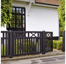 Schwarzer Holzzaun mit Gartentor vor einem Haus