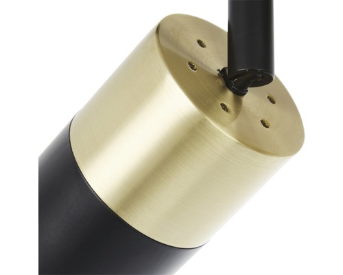 Detailaufnahme einer Deckenleuchte mit Messing und Metallelementen