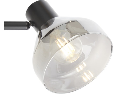 Nahaufnahme einer Lampe mit Glasschirm