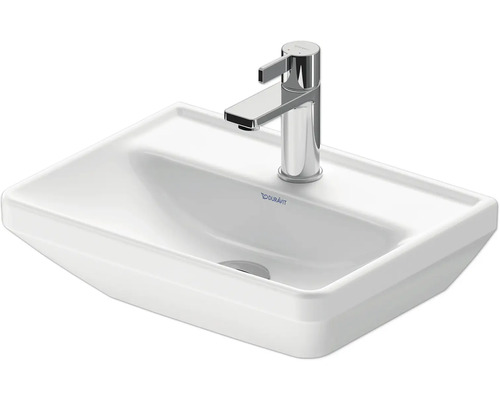 Vasque à poser blanche avec robinetterie chromée