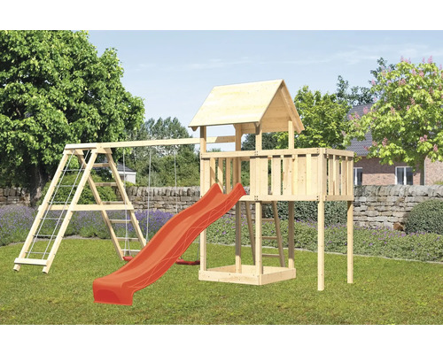 Tour de jeu avec balançoire, échelle et toboggan dans le jardin