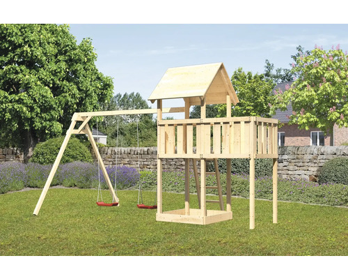 Tour de jeu avec balançoire en bois dans le jardin