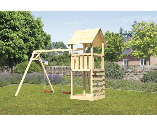 Tour de jeu avec balançoire et mur d''escalade dans le jardin