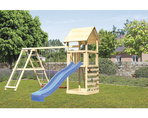 Aire de jeux avec balançoire, toboggan, mur d''escalade et tour en bois dans le jardin