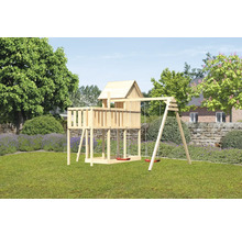 Tour de jeux avec balançoire dans le jardin