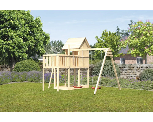 Tour de jeux avec balançoire dans le jardin