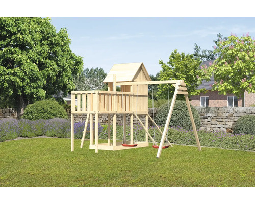 Maisonnette en bois avec balançoire dans le jardin