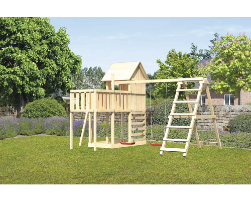 Spielturm Spielhaus Karibu Frieda 107 x 107 cm Holz bestehend aus Grundturm, Anbau, Plattform, Kletterwand Holzspielhaus mit Schaukel und Leiter im Garten.