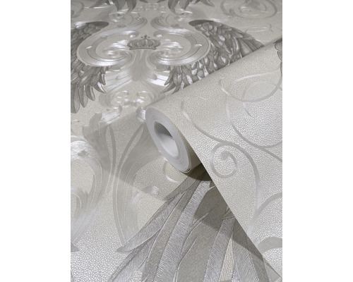 Rouleau de papier peint avec motif ailes et couronne