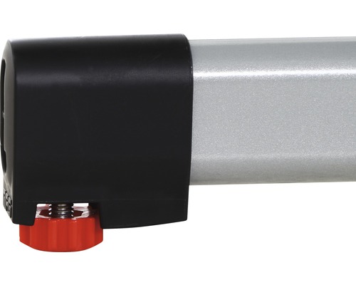 Vue détaillée d''un tube métallique avec embout noir et pied réglable rouge