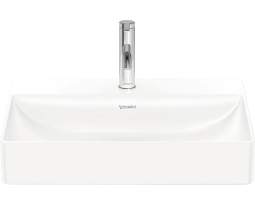 Lavabo en céramique blanche avec robinet