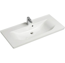 Waschtisch mit Armatur für das Badezimmer.