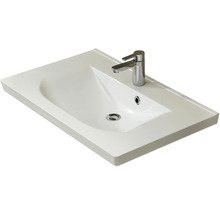 Waschtisch aus Sanitärkeramik mit Armatur