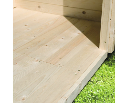 Vue détaillée du plancher en bois d''un abri de jardin