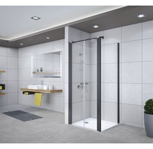 Salle de bain moderne avec cabine de douche, lavabo et miroir