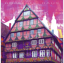 Hoppener Haus mit Backsteinfassade und verzierten Holzbalken