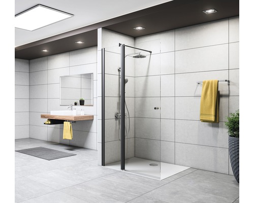 Salle de bains moderne avec douche, lavabo et porte-serviettes