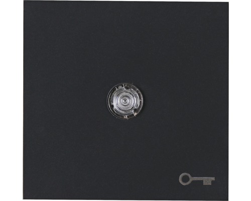 Une serrure avec une clé sur une surface sombre