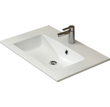 Waschtisch aus Sanitärkeramik mit Armatur