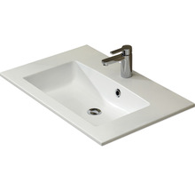Waschtisch aus Sanitärkeramik mit Armatur
