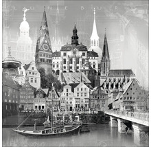 Image en noir et blanc de la ville de Lüneburg avec bâtiments, pont et rivière