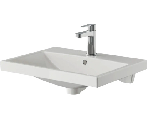 Lavabo en céramique blanc avec robinet