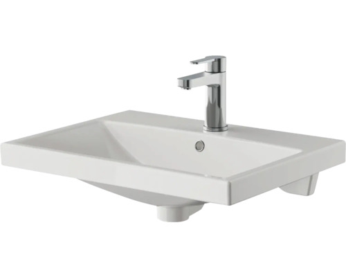 Lavabo en céramique avec robinetterie